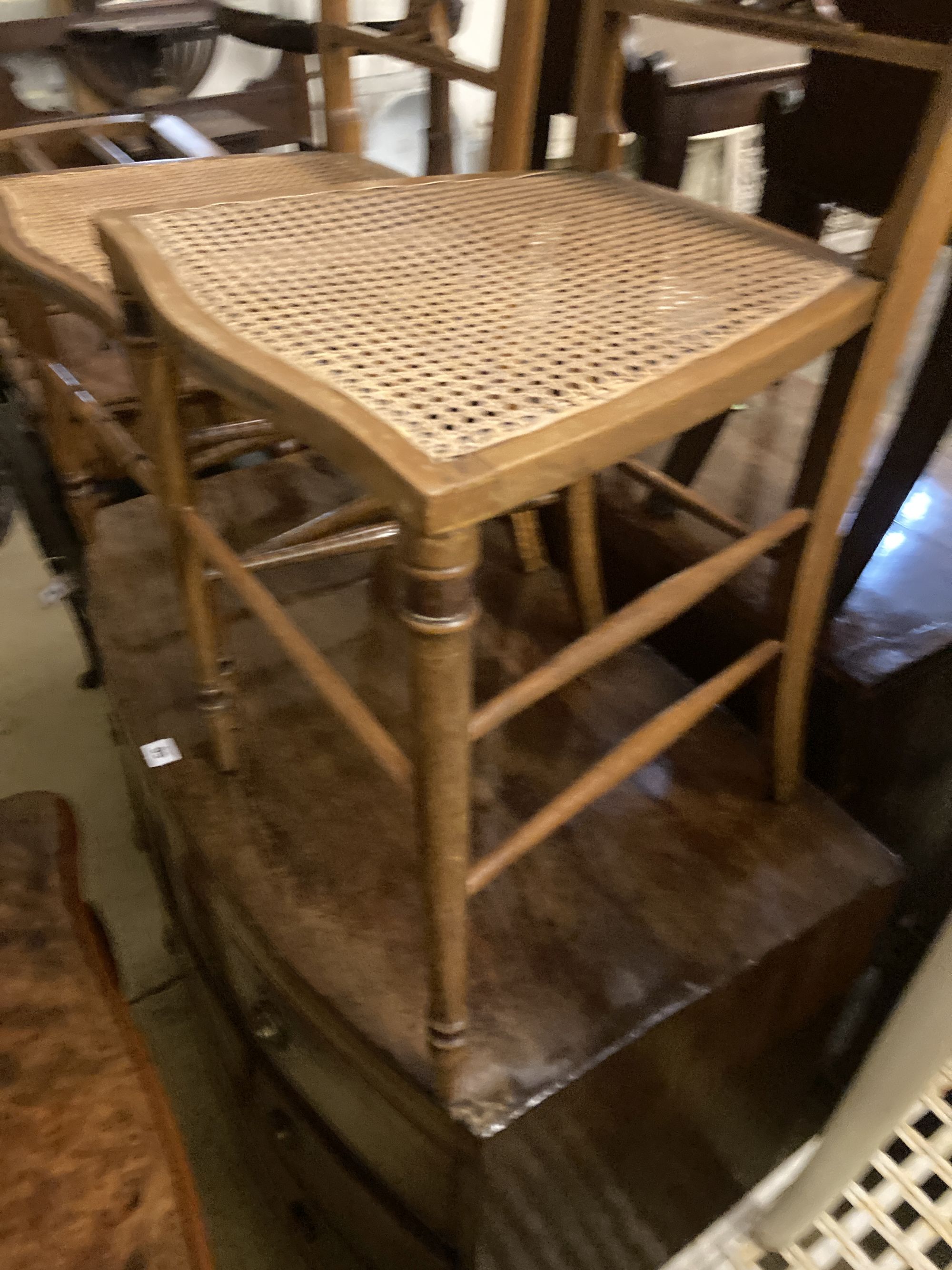 Two Edwardian cane seat chairs and a pair of painted Bentwood cane seat chairs